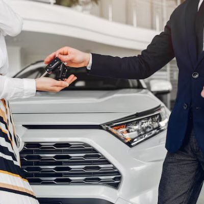 stylish-elegant-woman-car-salon_1157-20991